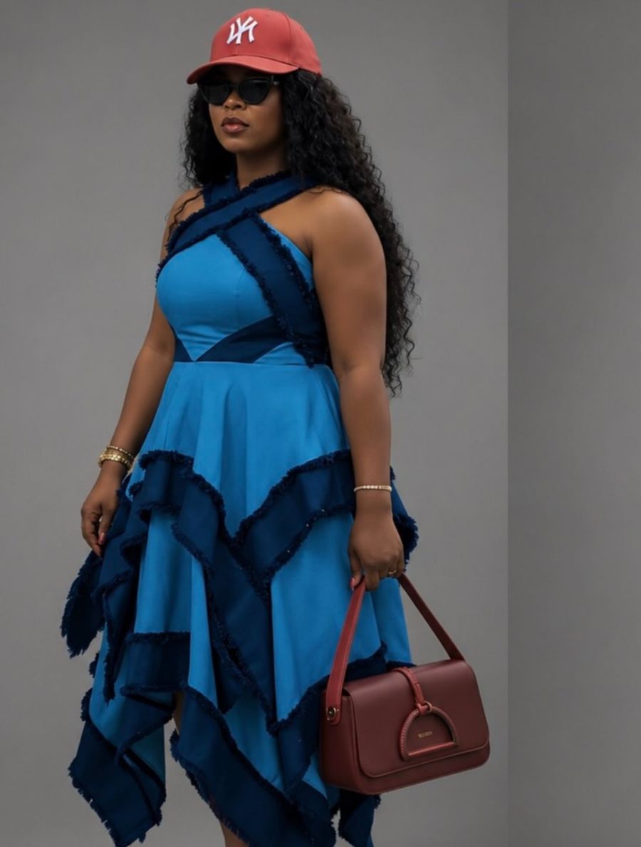 The Axis Dress frayed-denim edition styled with a red cap and burgundy bag